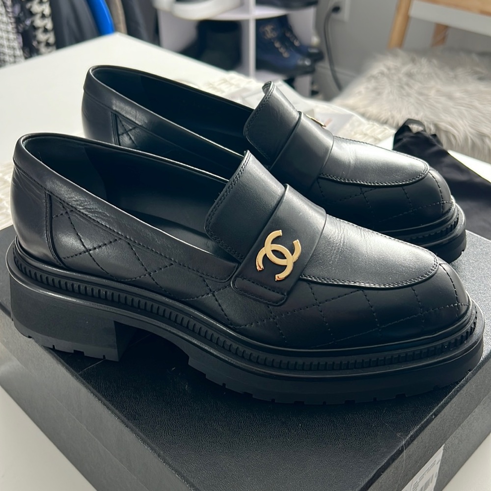 CHANEL Black Leather Loafers with Gold Accent